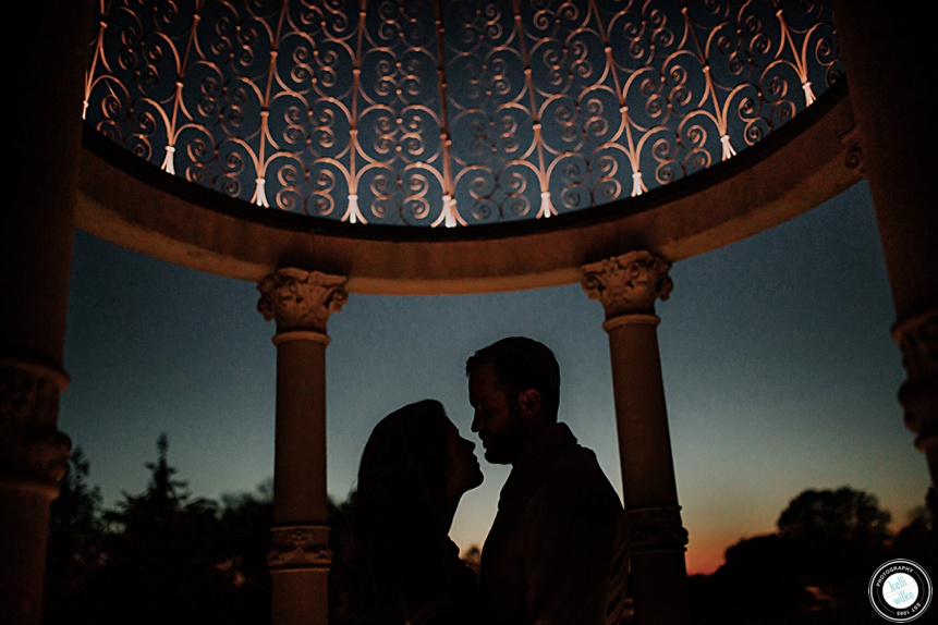 silhouette photo of a couple in a gazebo at sunset in longwood gardens in kennett square pennsylvania
