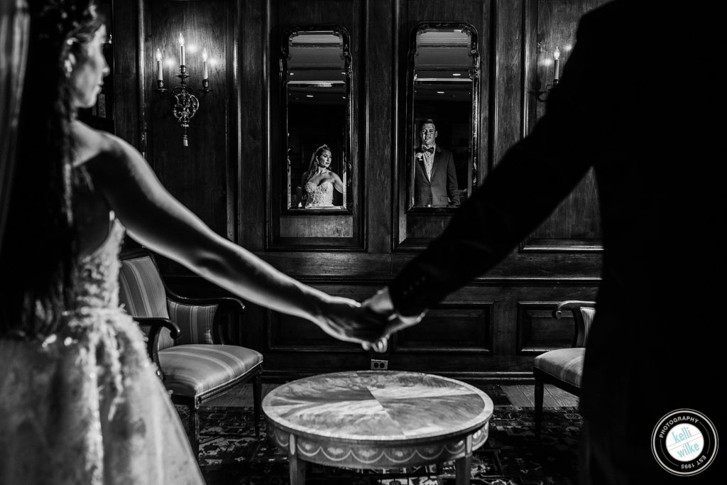 Interior portrait of a bride and groom at Greenville Country Club in Greenville Delaware