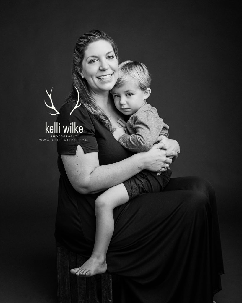 mother with her young son in a black and white portrait